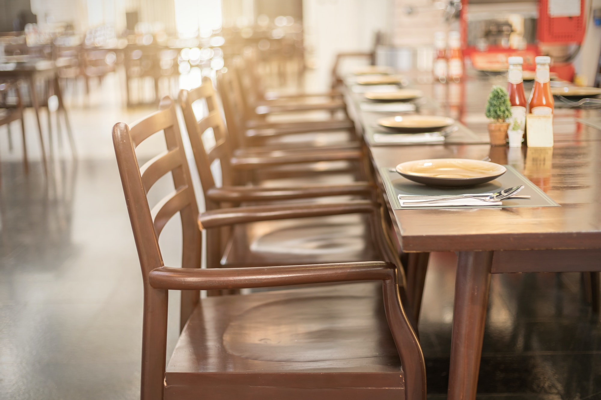 Empty table and chair in restaurant